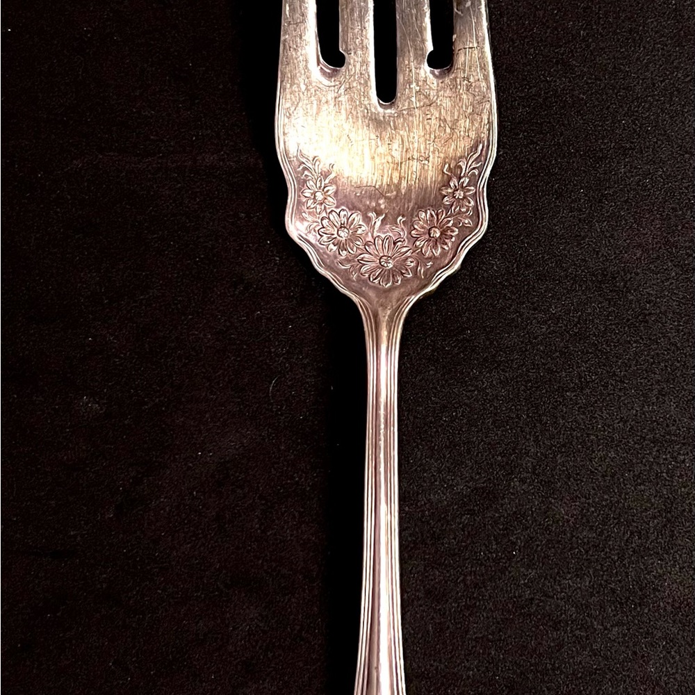 Antique Roger and Sons serving fork stamped 1910.